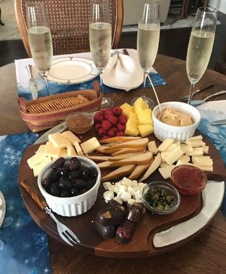 Logotipo personalizado Acceptable tabla de corte de acacia de ranura redonda con cuchillo y extensor