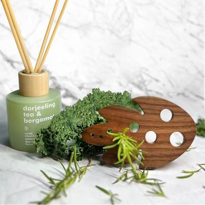 OEM/ODM Acceptable Exfoliador de hierbas de bambú para despojar de la col rizada de la col rizada 8 agujeros