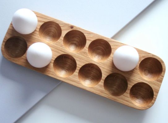 Práctico porta huevos de madera de nivel único para la organización de la encimera
