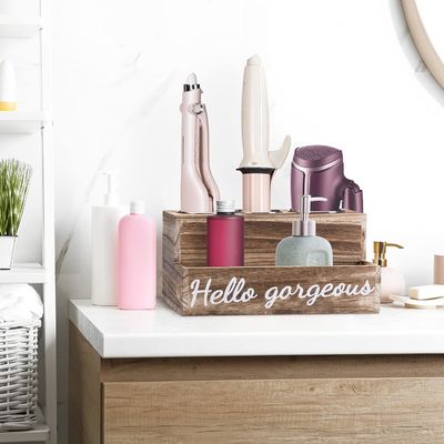 Mantenga su baño limpio sin esfuerzo con este soporte de secador y alisador de cabello de madera