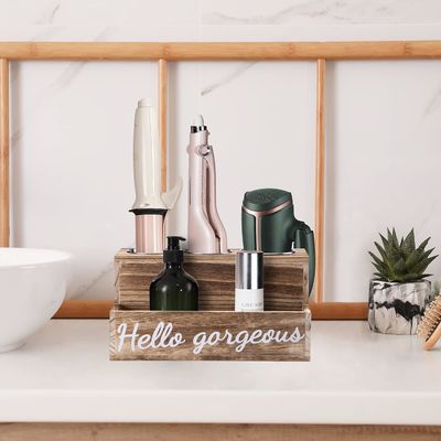 Mantenga su baño limpio sin esfuerzo con este soporte de secador y alisador de cabello de madera