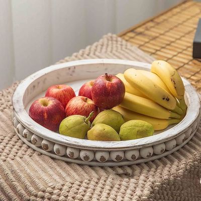 Envases de madera con diseño en blanco y con cuentas