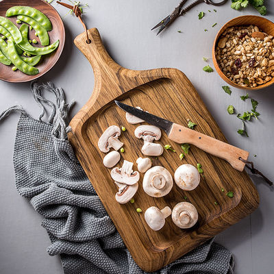 Mini tabla de corte de madera de acacia con diseño de madera de alimentos circulares y portacuchillos