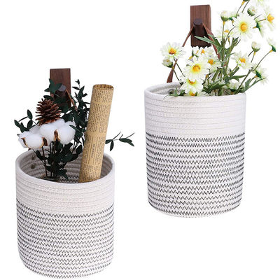 Cesta de cuerda de algodón pequeño colgado en la pared con cestas de almacenamiento de cuero en color personalizado
