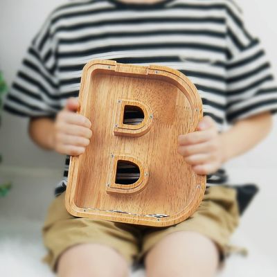 Carta de madera de alfabeto acrílico caja de dinero Impresión quemado letra grande bancos de cerdo para niños